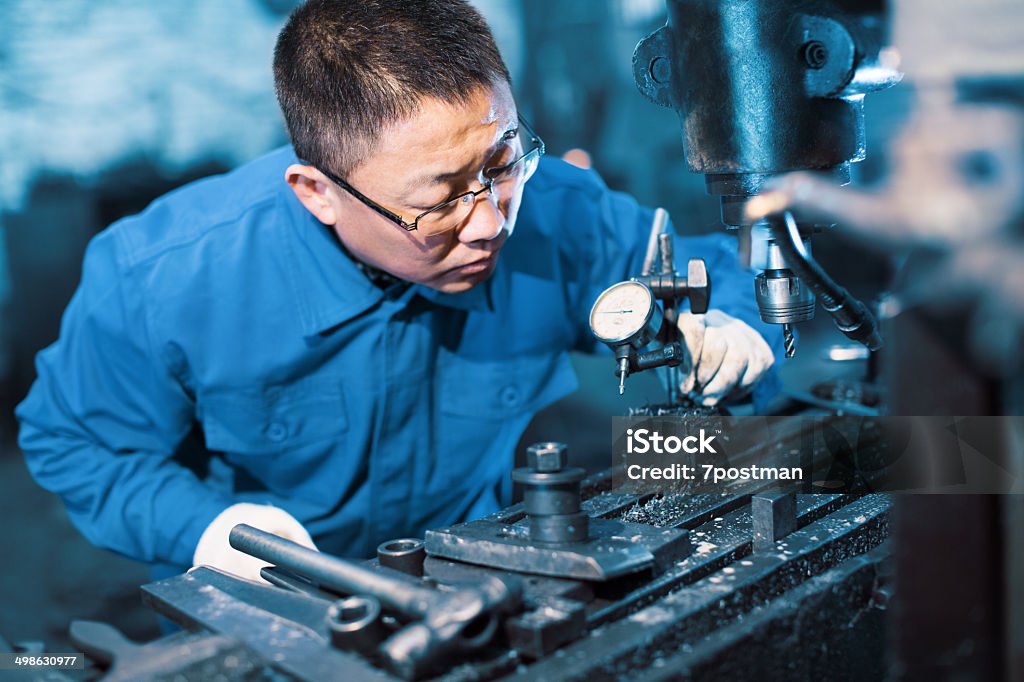 engineer on routine maintenance Heavy Metal Stock Photo