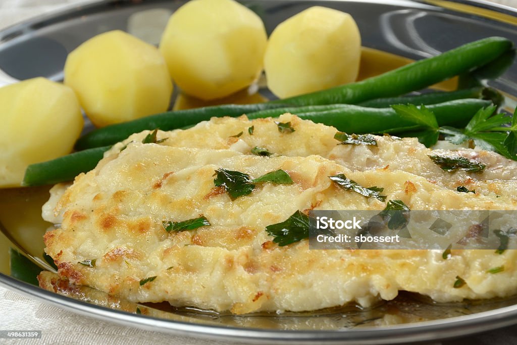 Sole Meuniere Sole Meuniere, the classic French fish dish of dover sole sauteed in brown butter. Dover Sole Stock Photo