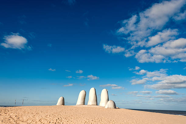hand sculpture, the symbol of punta del este, uruguay - uruguay stok fotoğraflar ve resimler