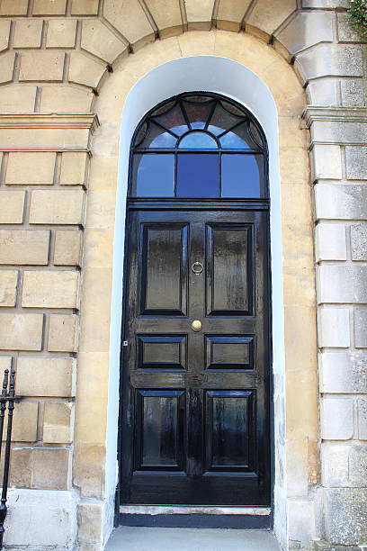 istock Image of black front door on Georgian house, Bath stone 498631725