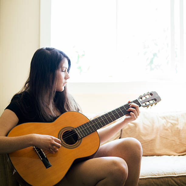 istock Musician Portrait Holding Guitar 498632659