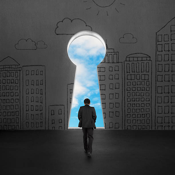 Walking toward key shape door with blue sky