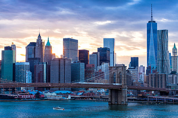 istock Manhattan Skyline with Brooklyn Bridge at Sunset 498633377