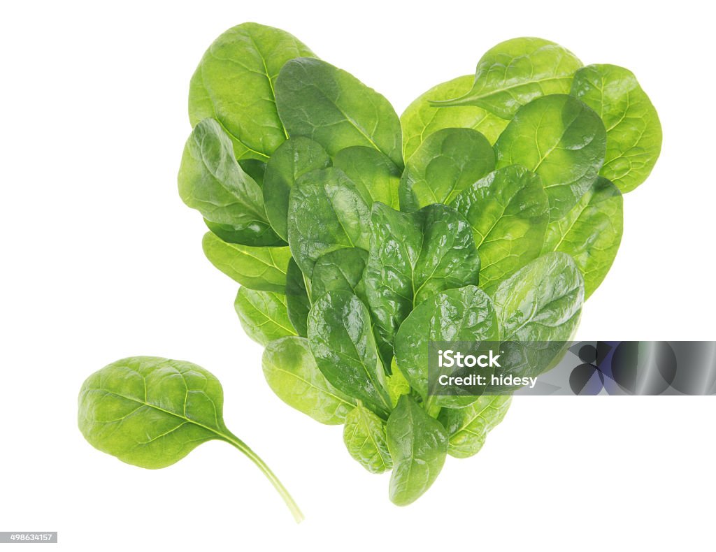 Baby spinach heart Heart made of baby spinach on white background Heart Shape Stock Photo