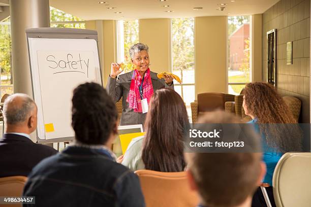 Safety In The Workplace Presentation With Workers Stock Photo - Download Image Now