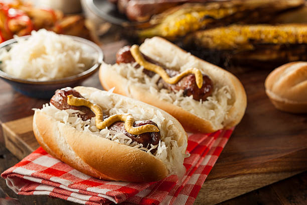 Homemade Bratwurst with Sauerkraut Homemade Bratwurst with Sauerkraut and Mustard bratwurst stock pictures, royalty-free photos & images