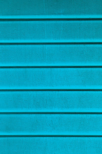 istock Grungy light blue plastic wall sheathing cover fragment 498643945