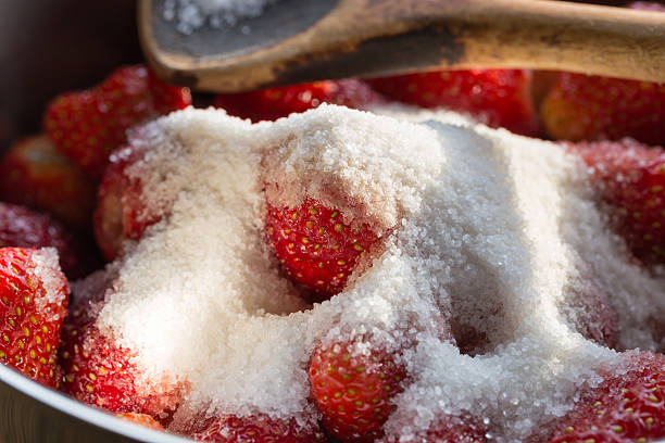 istock Strawberry jam cooking encore of sugar 498644419
