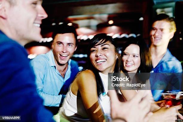 Happy Interaction Between Friends At Club Bar Stock Photo - Download Image Now - 20-29 Years, Activity, Adult