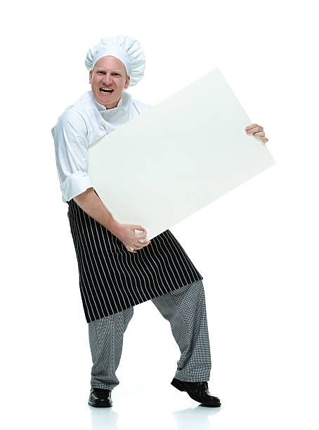 istock Chef holding placard in an excited manner 498644955