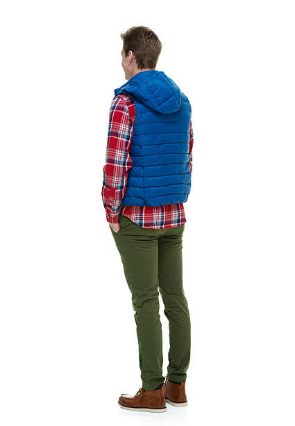 istock Rear view of young man standing 498646621