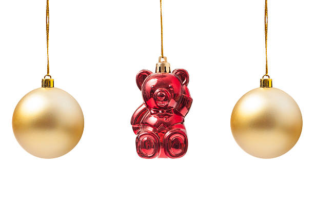istock Christmas golden globes and red bear decoration 498649312