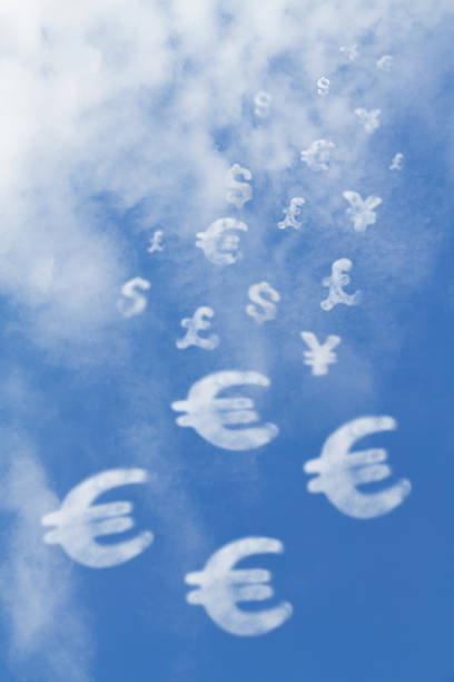 Money sign falls from the sky stock photo