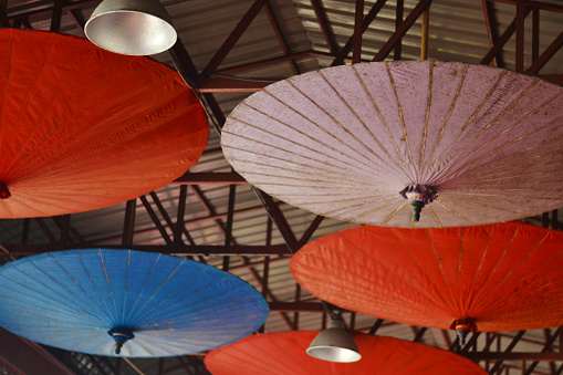 Umbrella decorations hanging on ceiling.