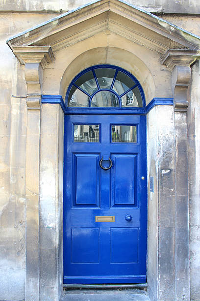 istock Image of blue front door on Georgian house, Bath stone 498650827