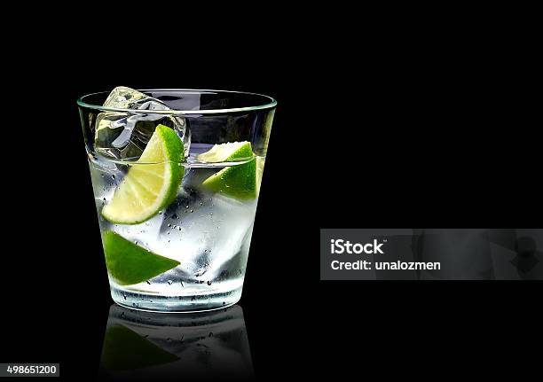 Vodka With Lime And Ice Stock Photo - Download Image Now - Vodka, Black Background, Cocktail