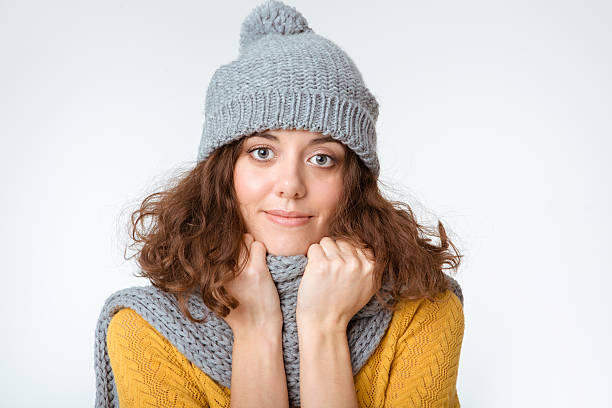 istock Woman with scarf and hat looking at camera 498655196
