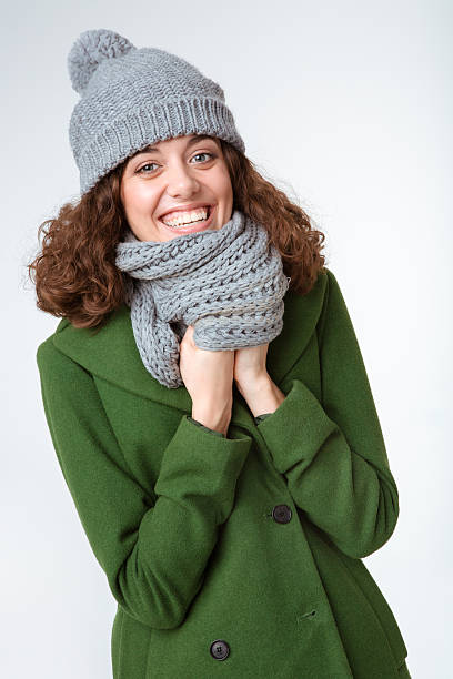 istock Smiling woman in winter cloth looking at camera 498655356