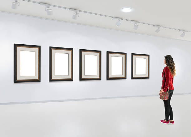 istock Lonely young woman visits an art exhibition 498657076