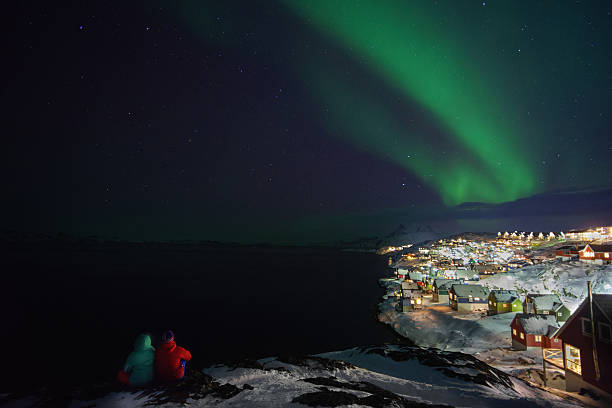 istock Couple watch Aurora at Nuuk Old Town 498657166
