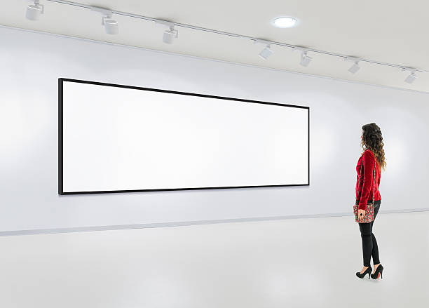 istock Young woman visits an art gallery 498657506