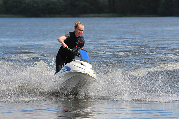 istock Action Photo girl on jet ski. 498657938