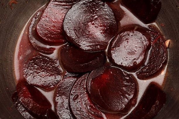 istock Red beet slices in oil 498664212