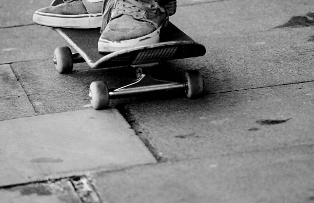 istock grungy sneakers and skateboard 498665325
