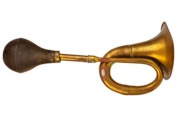 istock Vintage brass car horn isolated on white 498666077