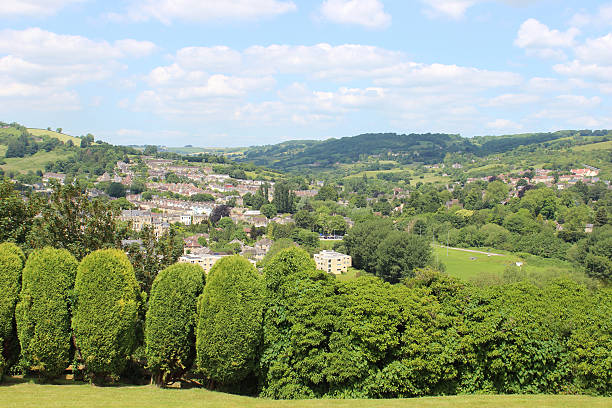 istock Bath city in summer, showing countryside views and conifer hedge 498666121