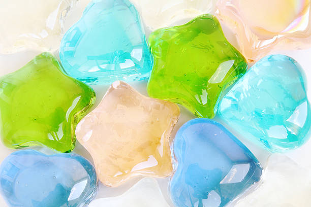 istock Composition with glossy glass star and heart shapes on white 498666601
