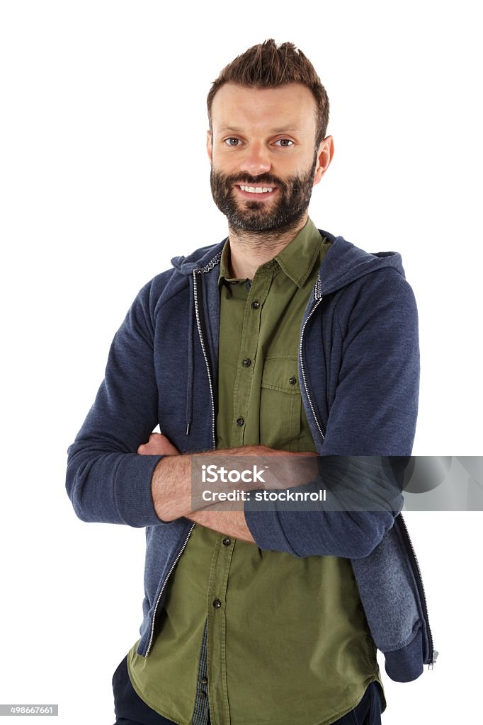 Handsome young man with beard Portrait of handsome young man with beard standing arms crossed against white background. 25-29 Years Stock Photo