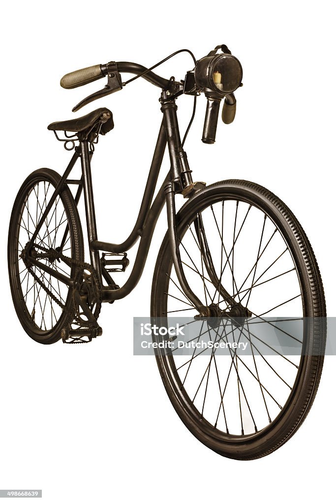 Retro styled image of a nineteenth century bicycle Retro styled image of a nineteenth century lady bicycle with lantern isolated on a white background 19th Century Style Stock Photo