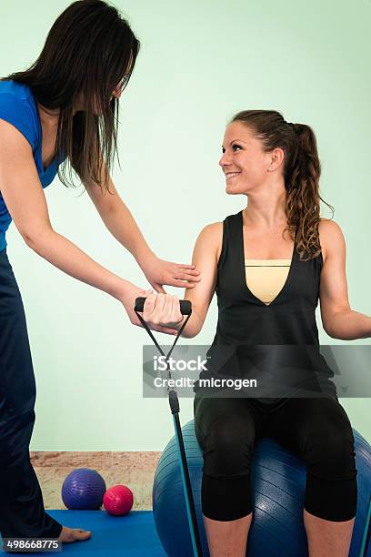 Physical Therapy With Resistance Band Stock Photo - Download Image Now - 30-39 Years, Active Lifestyle, Adult