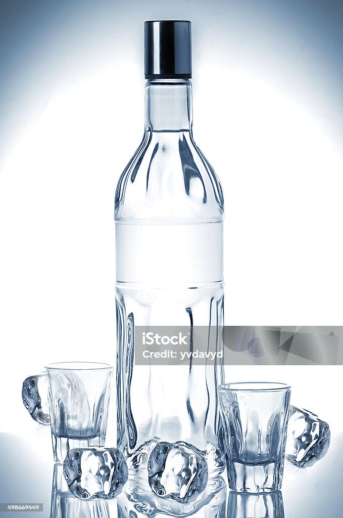 Bottle of vodka and ice cubes Alcohol - Drink Stock Photo