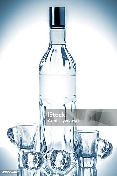 Bottle Of Vodka And Ice Cubes Stock Photo - Download Image Now - Alcohol - Drink, Alcohol Abuse, Bottle