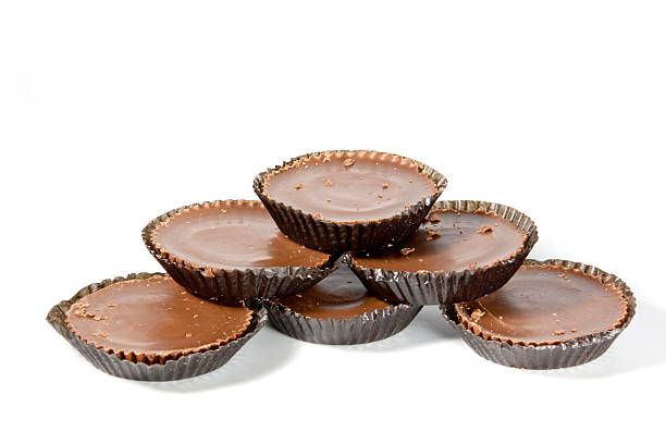 istock Arrangement of Six Brown Chocolates in Protective Papers 498671431