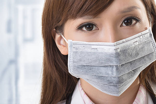 istock Asian doctor look at you 498682109