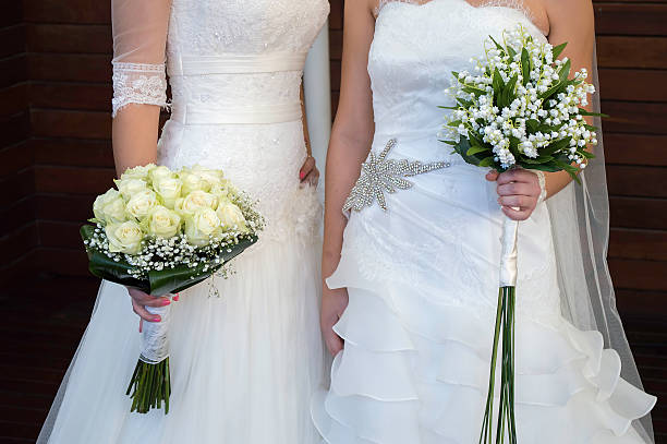 civil wedding of a lesbian close up of wedding of a lesbian couple marriage equality stock pictures, royalty-free photos & images