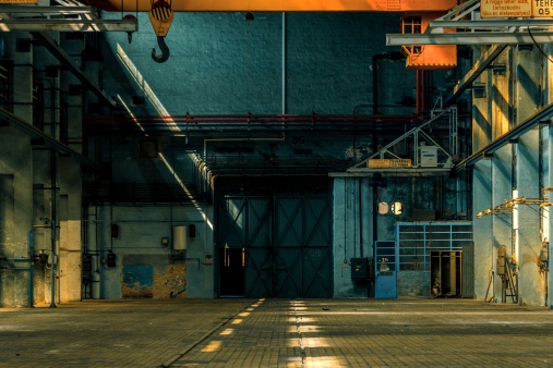 Dark industrial interior of an old building