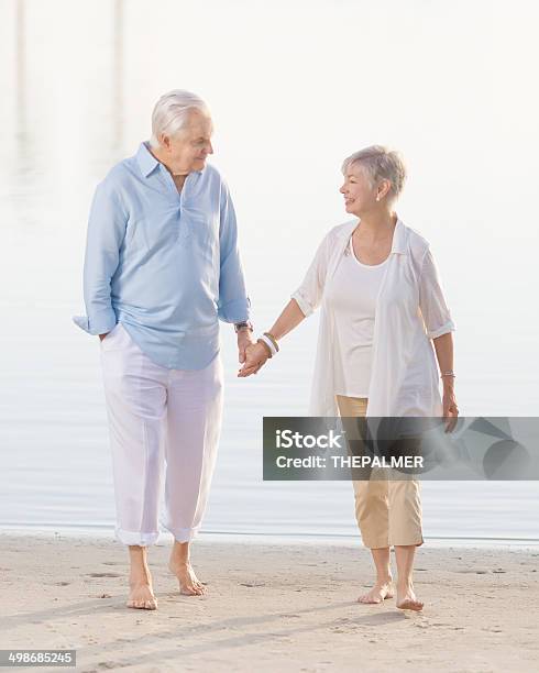 Senior Couple Stock Photo - Download Image Now - Beach, Senior Couple, Walking