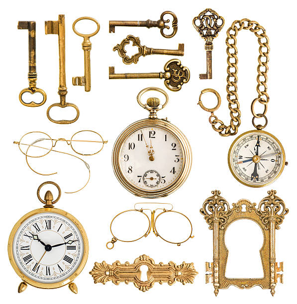 istock golden antique accessories. vintage keys, clock, compass, glasse 498686731
