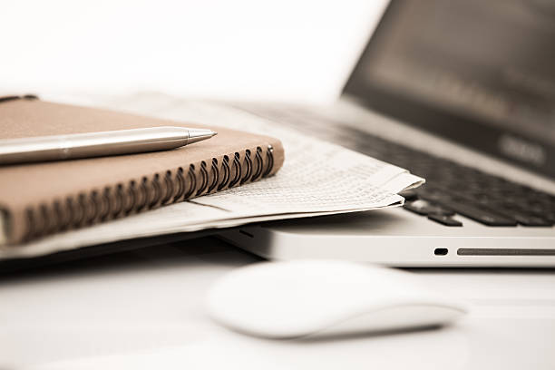 istock Businessman analyzing investment charts with laptop 498686963