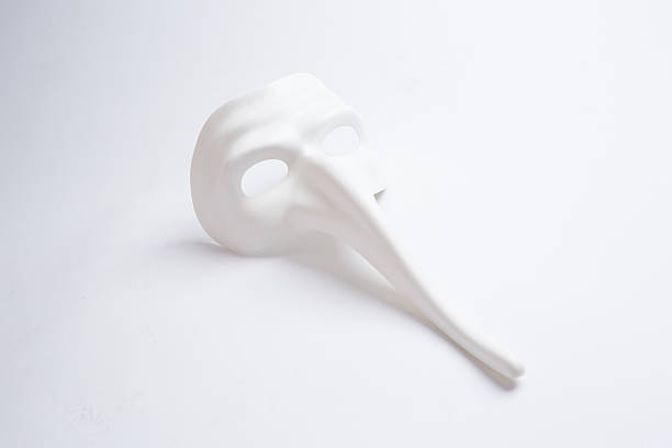 istock white venetian mask on a white background 498687388