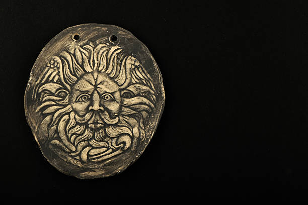 istock Ceramic male Gorgon Medusa head in Bath isolated on black 498687396