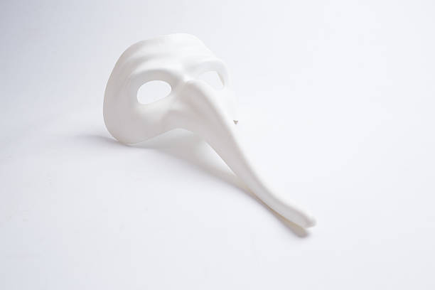 istock white venetian mask on a white background 498687460