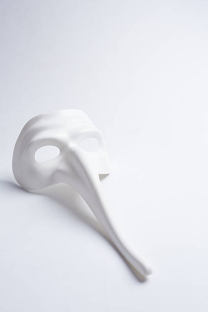 istock white venetian mask on a white background 498687862