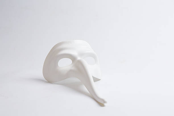istock white venetian mask on a white background 498688404