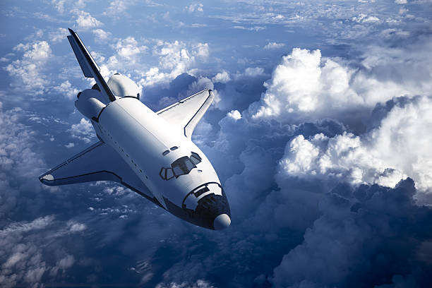 Space Shuttle Landing In The Clouds Space Shuttle Landing In The Clouds. 3D Scene. lander spacecraft stock pictures, royalty-free photos & images