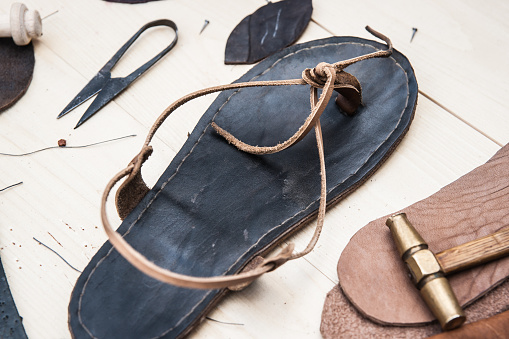 Making of ancient leather sandals using the antique technology